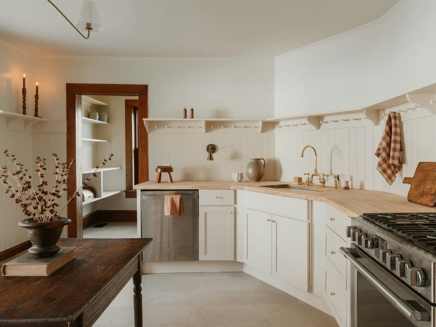 Prepared example kitchen with white cabinets and warm wood details